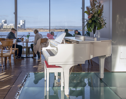 White piano in tearoom 