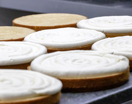Several Victoria Sandwich cakes being prepared in the Galley.