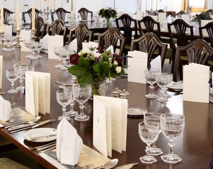 Tables set for dinner in the State Dining Room.