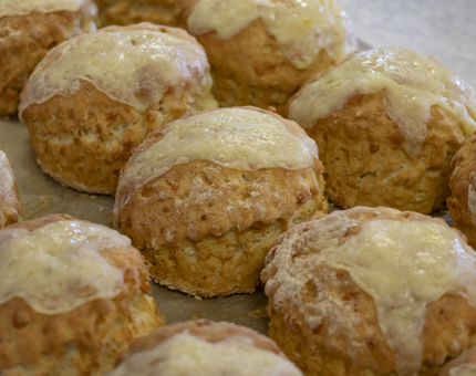 A tray of cheese scones. 