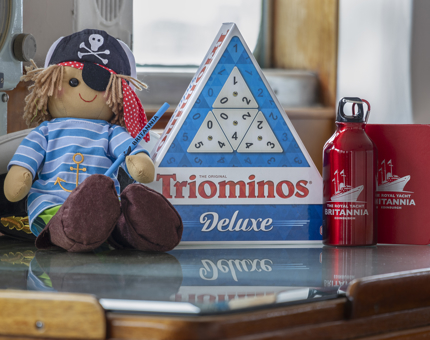 Gift for children from the Britannia Gift Shop including a pirate rag doll, dominos game and reusable drinks bottle. 