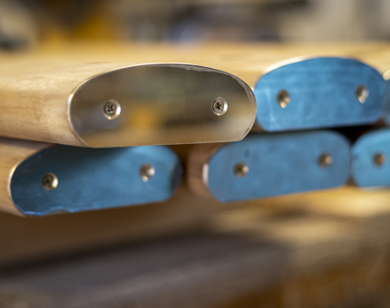 A close up shot of the ends of handrails.