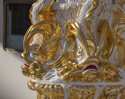 A close up detail of the decorative binnacle.