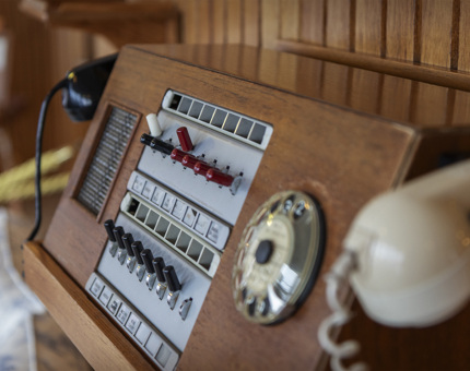 An old style telephone with two handsets.