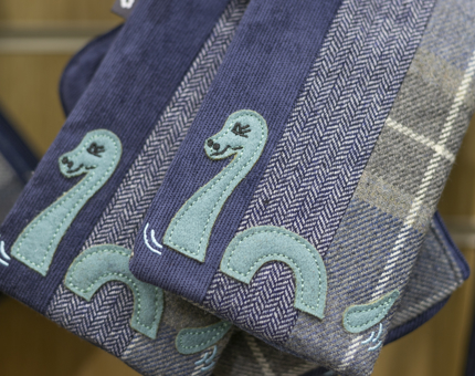 Loch Ness Monster-themed embroidered gifts from the Shop. 