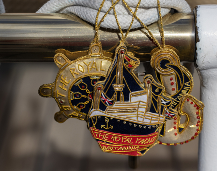 A set of three embroidered nautical themed Christmas decorations.