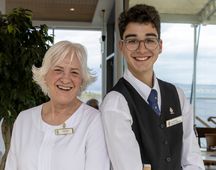 Two members of the Tearoom team in the Royal Deck Tearoom. 
