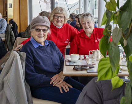 A group of three friends enjoying a catch up in the Tearoom. 