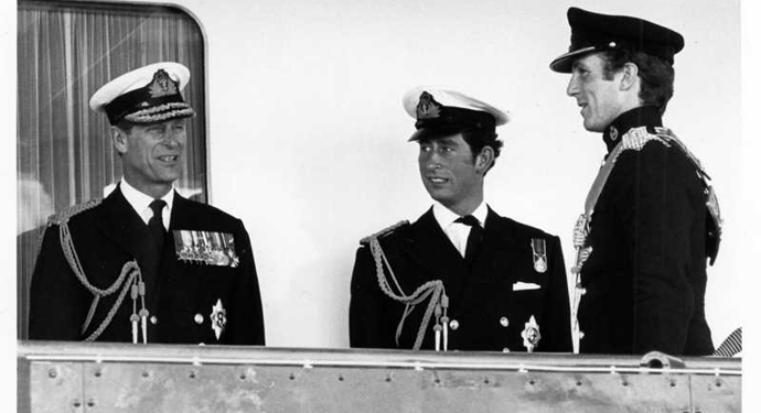Prince Charles and Prince Philip in uniform aboard Britannia© Crown Copyright 
