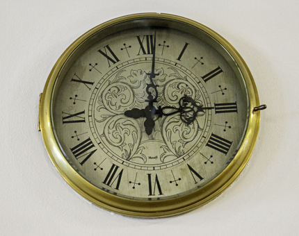 Close-up of clock showing the time of 3.01pm.