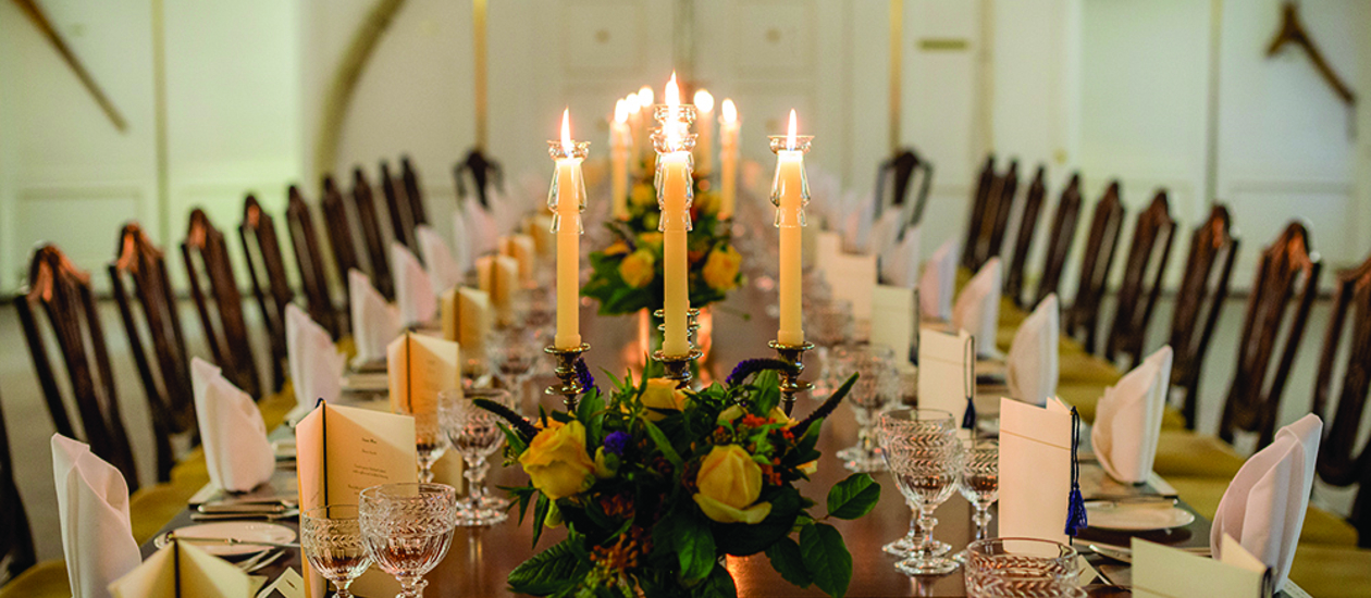 A long table is set for dinner in the State Dining Room. 