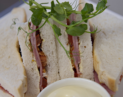 A ham and tomato sandwich platter from the Royal Deck Tea Room.