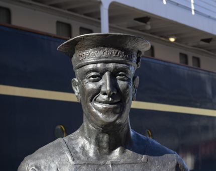 A close up of the statue of longest serving Royal Yachtsman Ellis 'Norrie' Norrell MVO RVM.