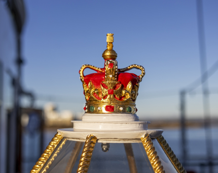 The crown detail on top of the decorative binnacle located on the Verandah Deck of Britannia in the Port of Leith. 