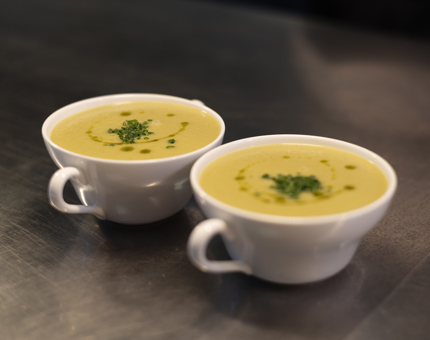 Two bowls of leek and potato soup. 