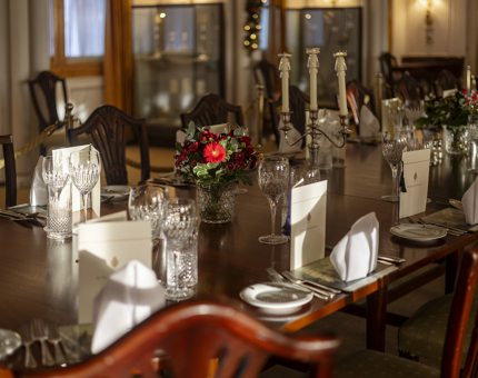 The table is set in the State Dining Room aboard Britannia in Leith. 