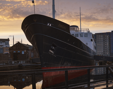 Fingal Hotel, a ship, in Leith at sunset. 