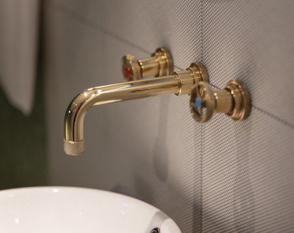 A close up of a brass tap in one of Fingal's cabins. 