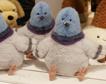 Three Jellycat pigeon plush toys. 