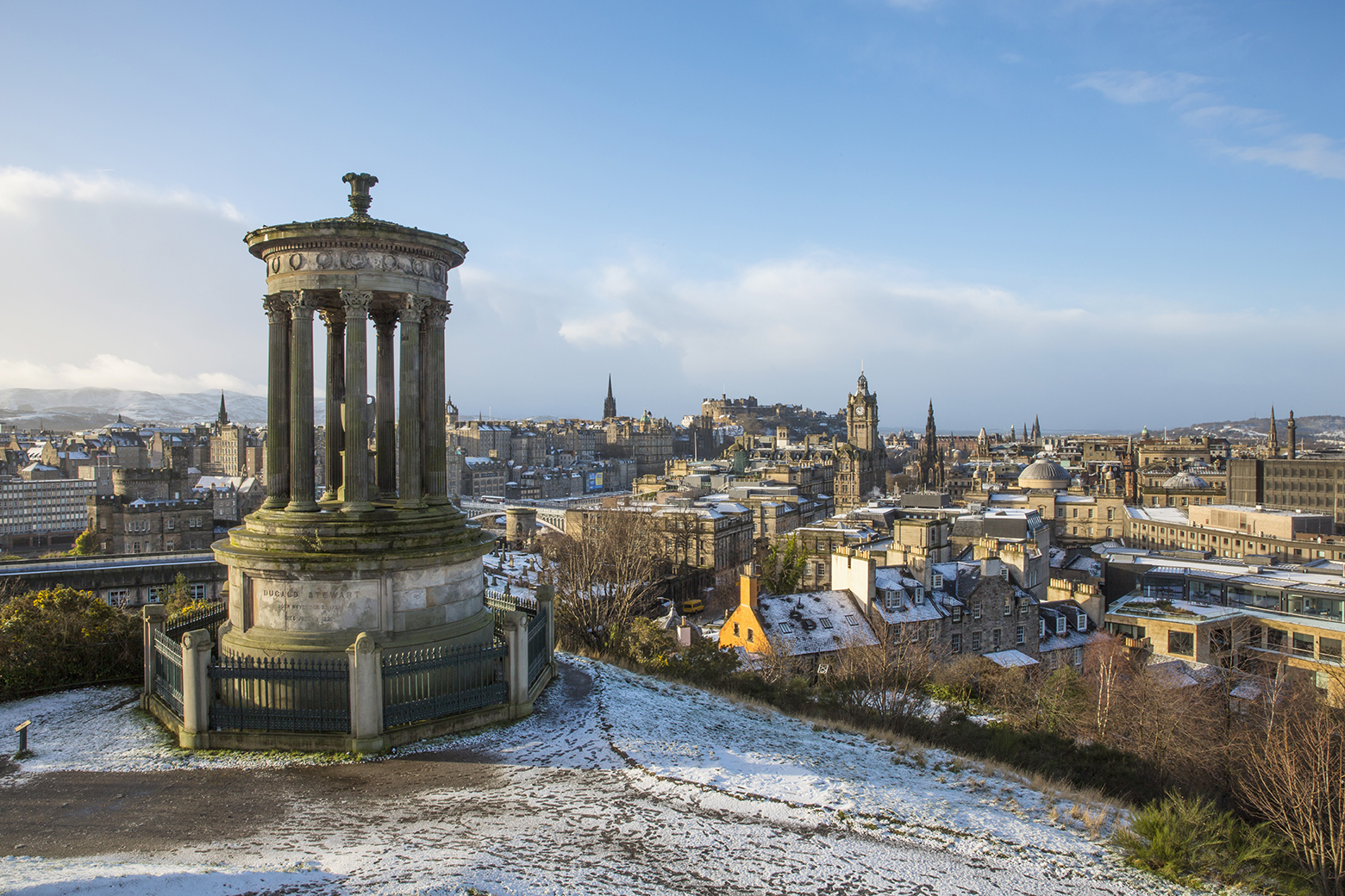 A view of Edinburgh's skyline from Calton Hill, covered in snow