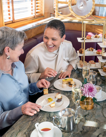 Mother and daughter enjoying Afternoon Tea