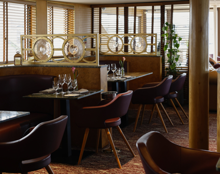 The tables in the Art Deco inspired Lighthouse Restaurant are set and ready to welcome diners. 