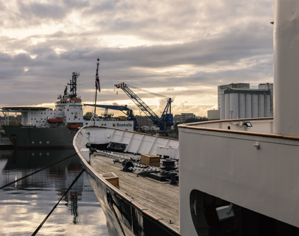 A view form the Bow of Britannia, there is a large ship in the background. 